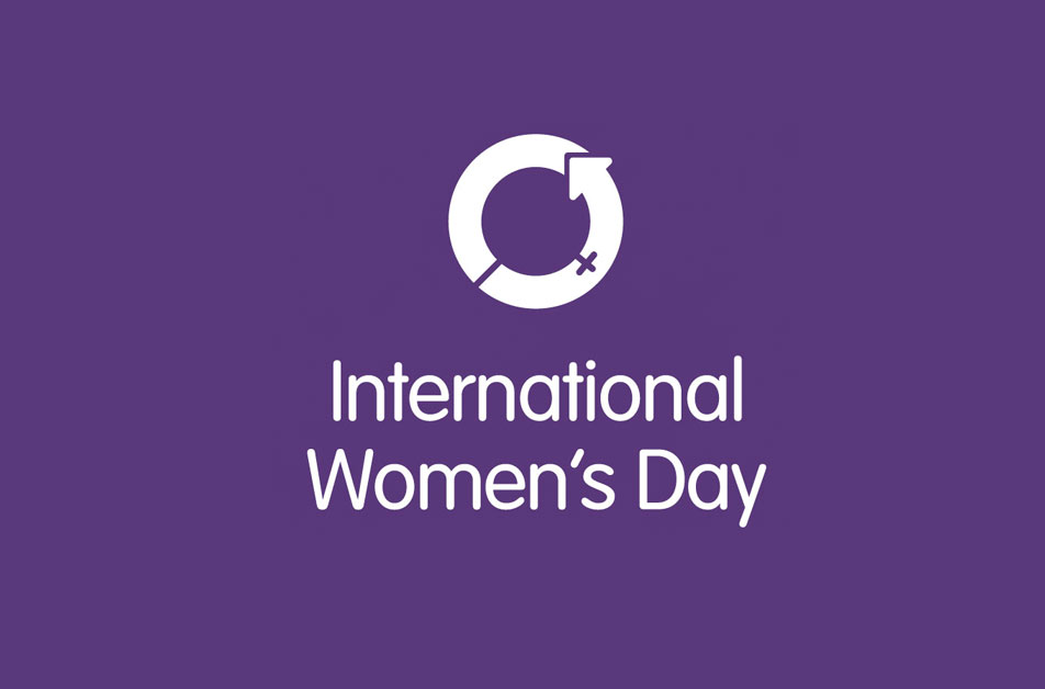 Purple background featuring the International Women's Day logo, a white circle with an arrow, alongside bold white text reading "International Women's Day."