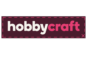 The word "hobbycraft" in white and pink letters on a dark maroon background with stitching.