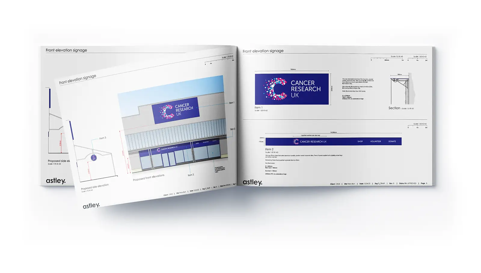 Open booklet showing design plans for Cancer Research UK signage on a building.