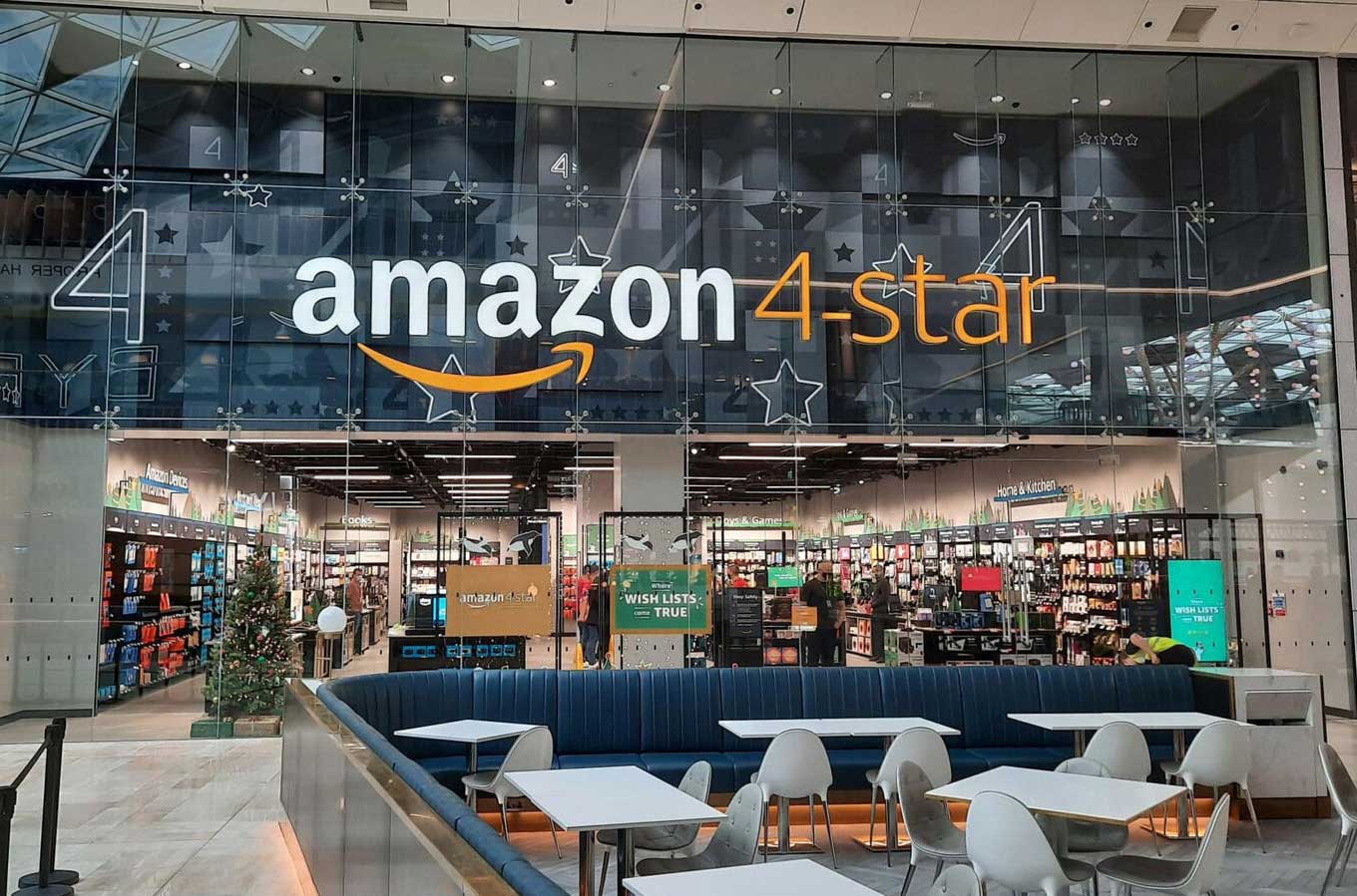 Amazon 4-star store entrance with visible interior shelves and seating area in the foreground.