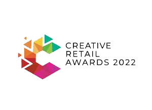 Creative Retail Awards 2022 logo featuring multi-colored geometric triangles on a white background with bold black text.