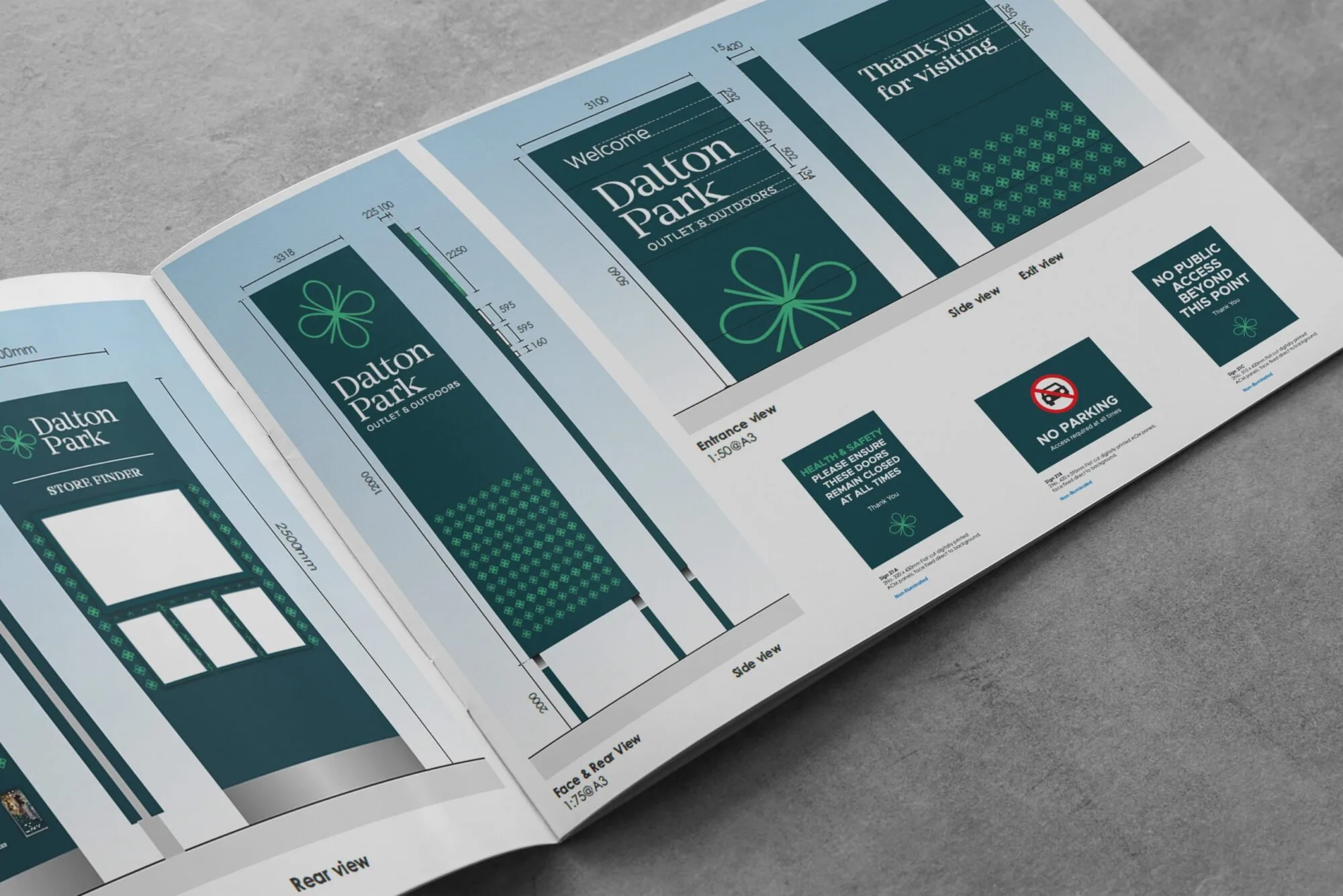 Open booklet showing Daulton Park signage designs with green and white color scheme.